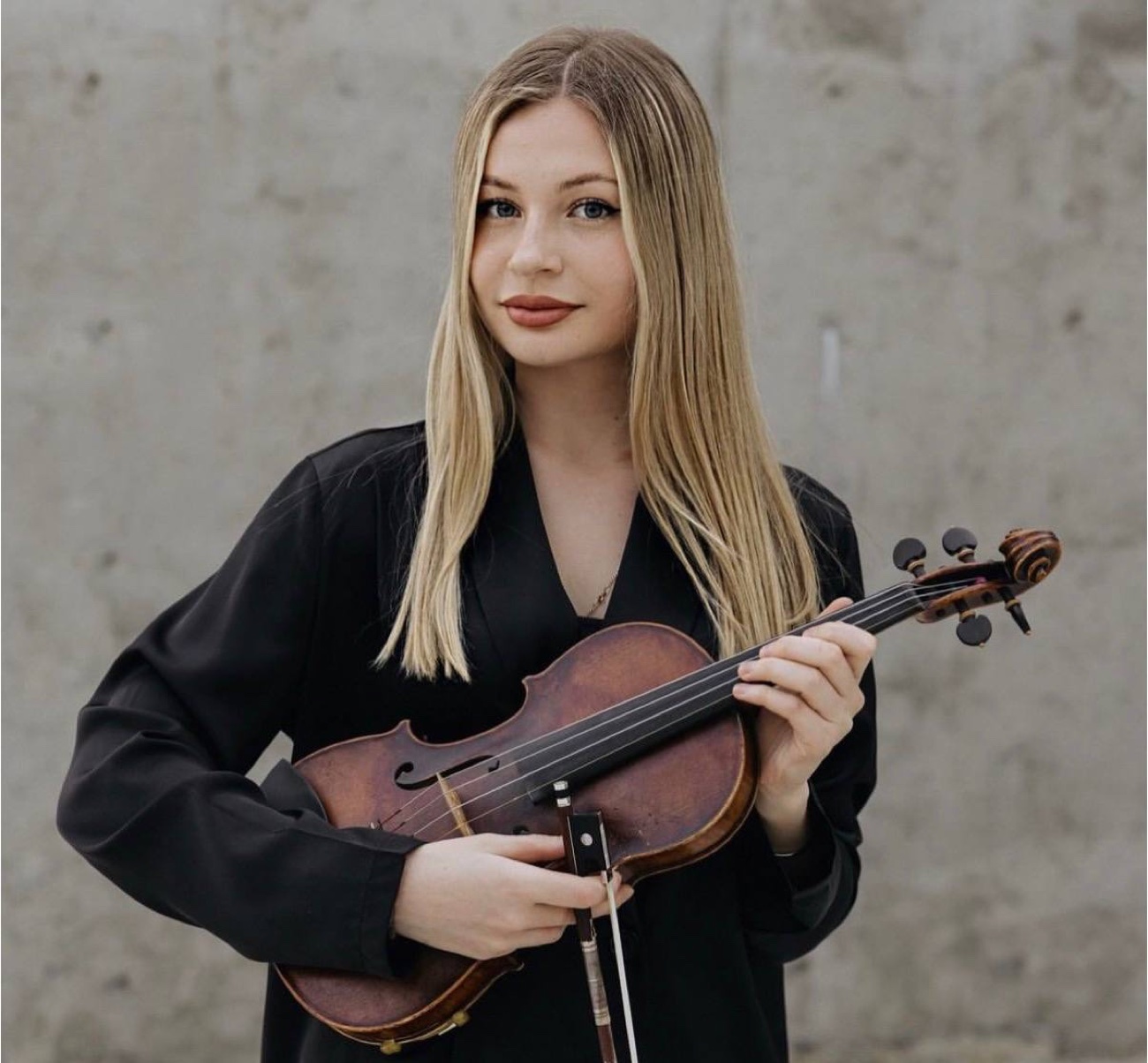 Varya, Violin teacher